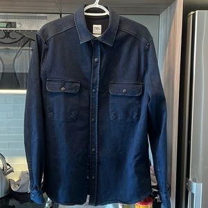 You can’t go wrong with a jean shirt. Excellent condition.